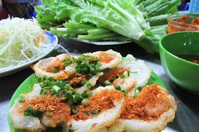 Eating Banh Khot In Vietnam